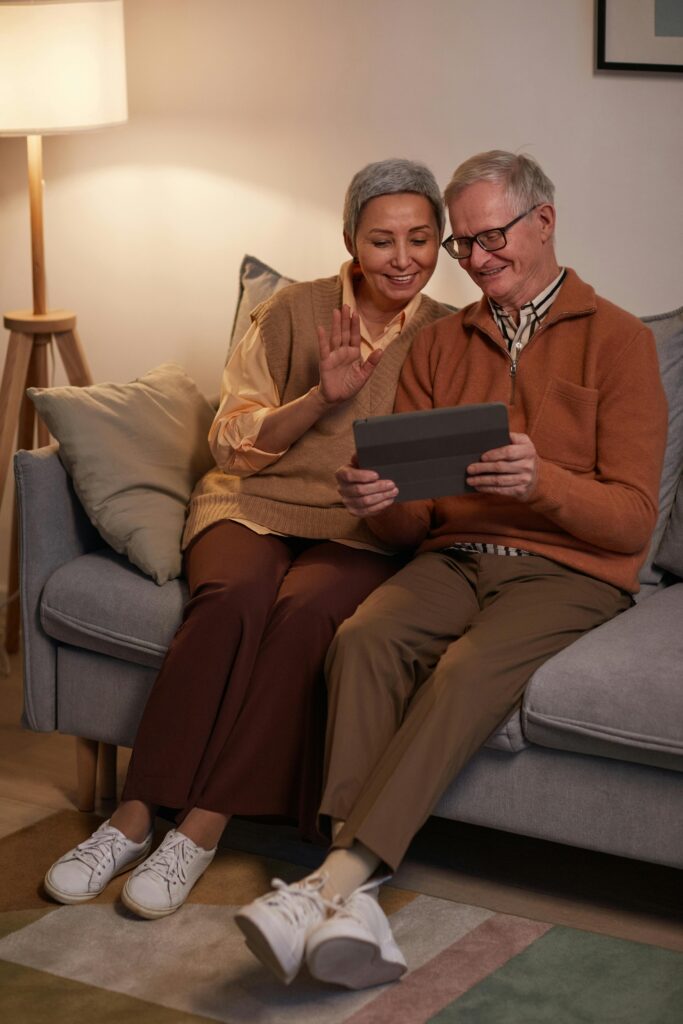 Caregiver using mobile communication tools in assisted living facility